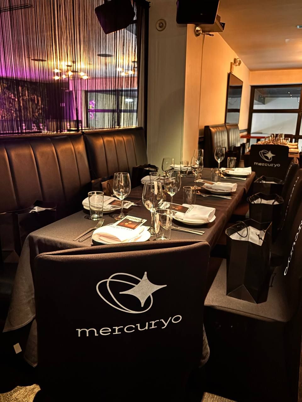 Mercuryo branded dinner and hospitality event setup
