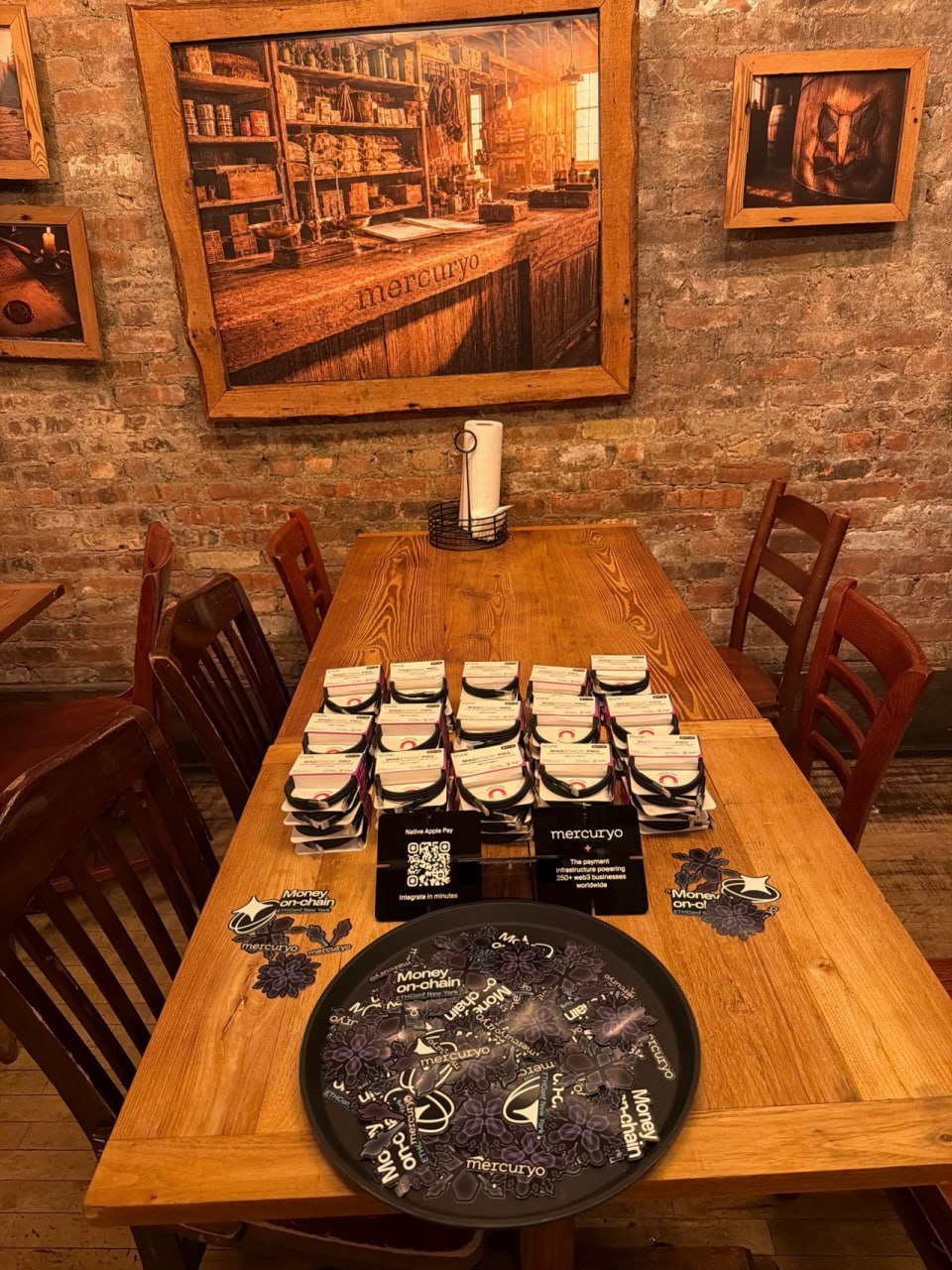 Mercuryo event merchandise and branded materials arranged for distribution