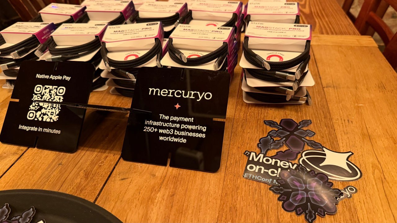 Mercuryo payment event cards, cables and branded conference materials